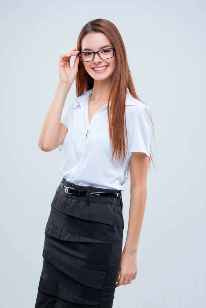 smiling young business woman glasses 11zon scaled 2